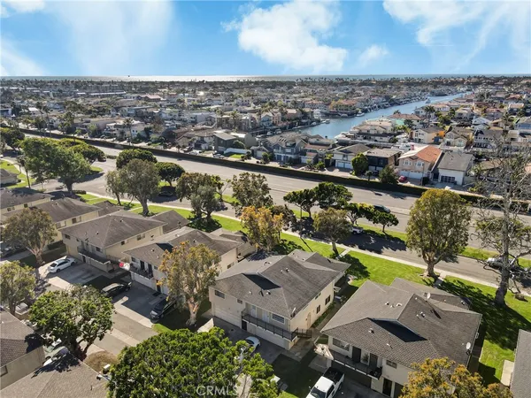 an aerial view of a city with lots of residential buildings