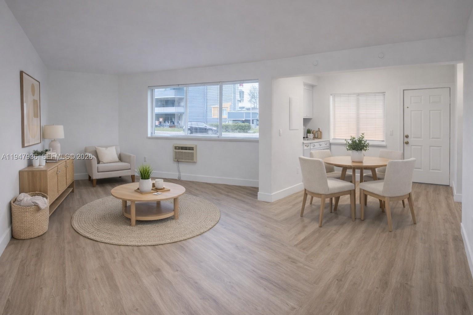 a dining room with furniture and wooden floor