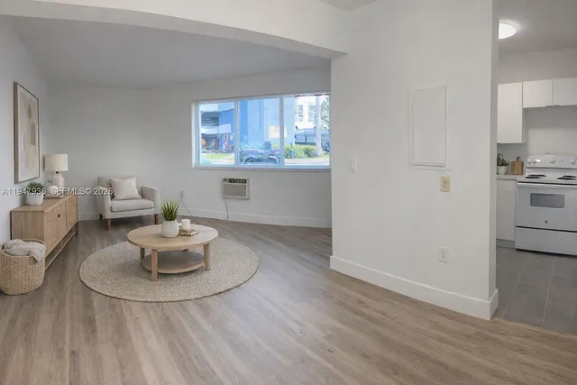 a living room with furniture and window