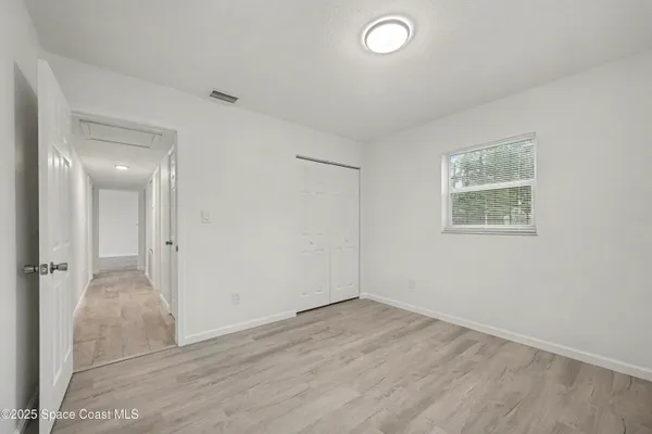 an empty room with a workbench