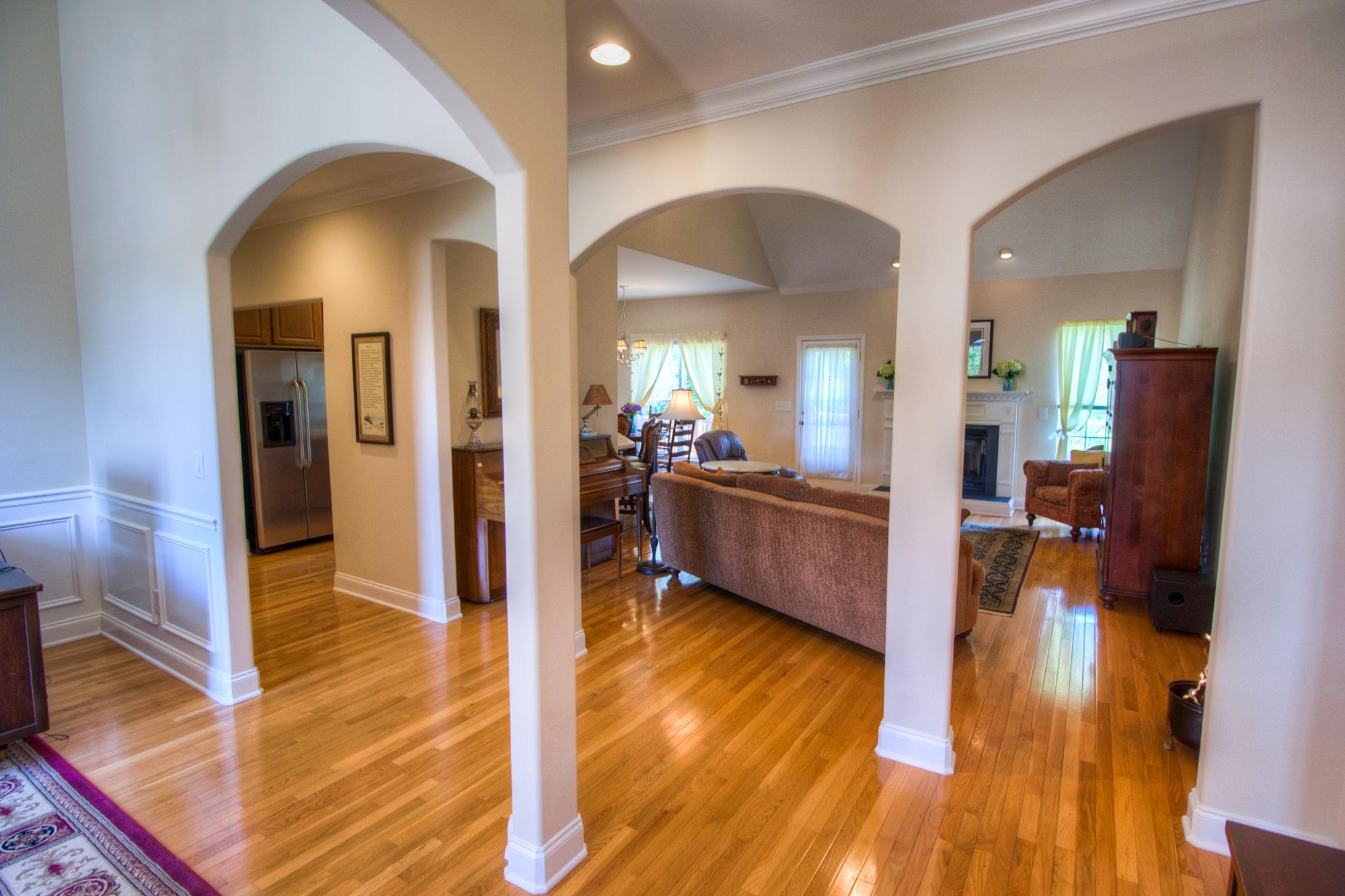 7084 Red Apple Road Antioch, TN 37013 - Photo 2 of 30 a view of living room and kitchen with wooden floor