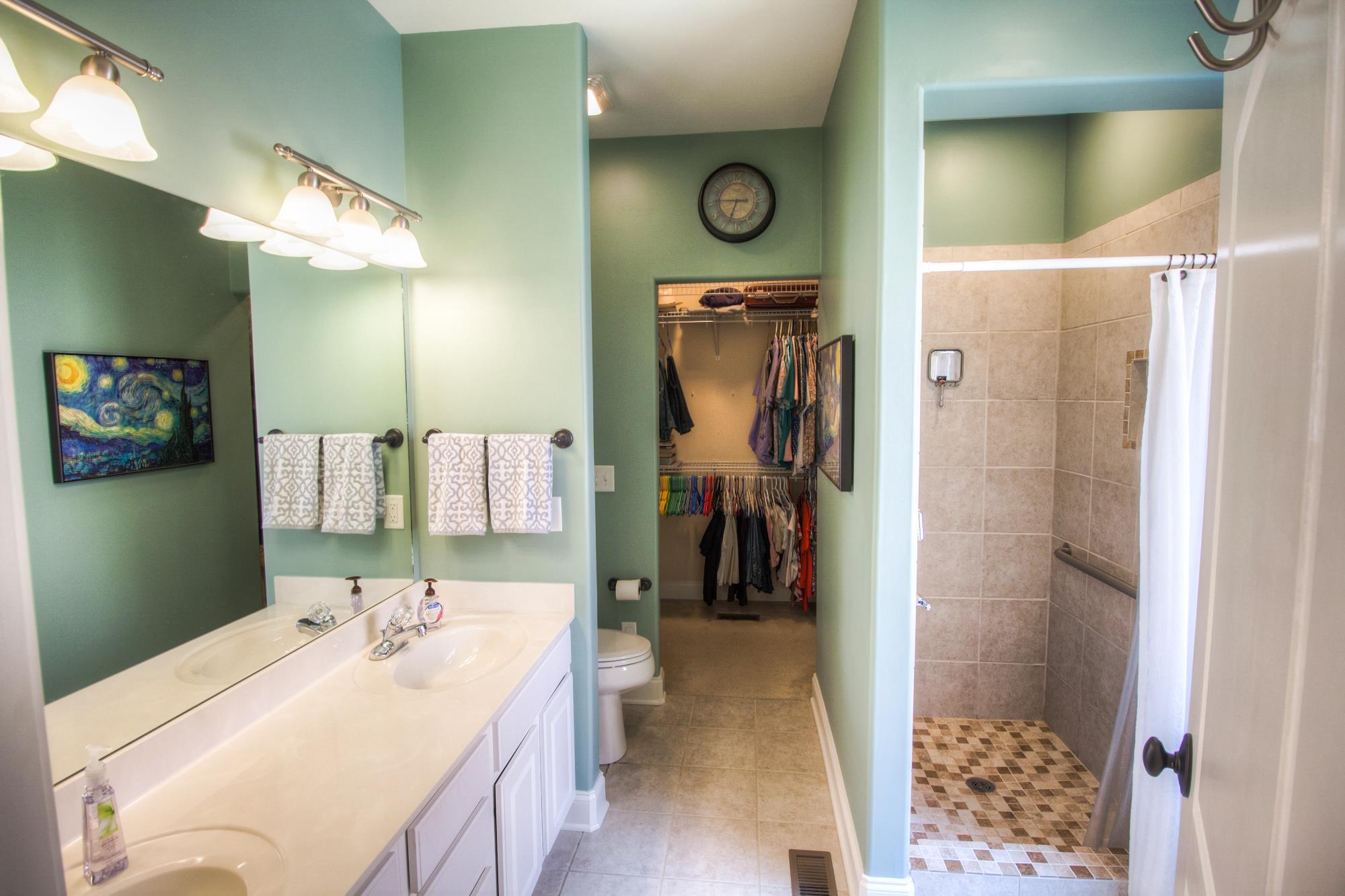 7084 Red Apple Road Antioch, TN 37013 - Photo 14 of 30 a bathroom with a sink and a mirror