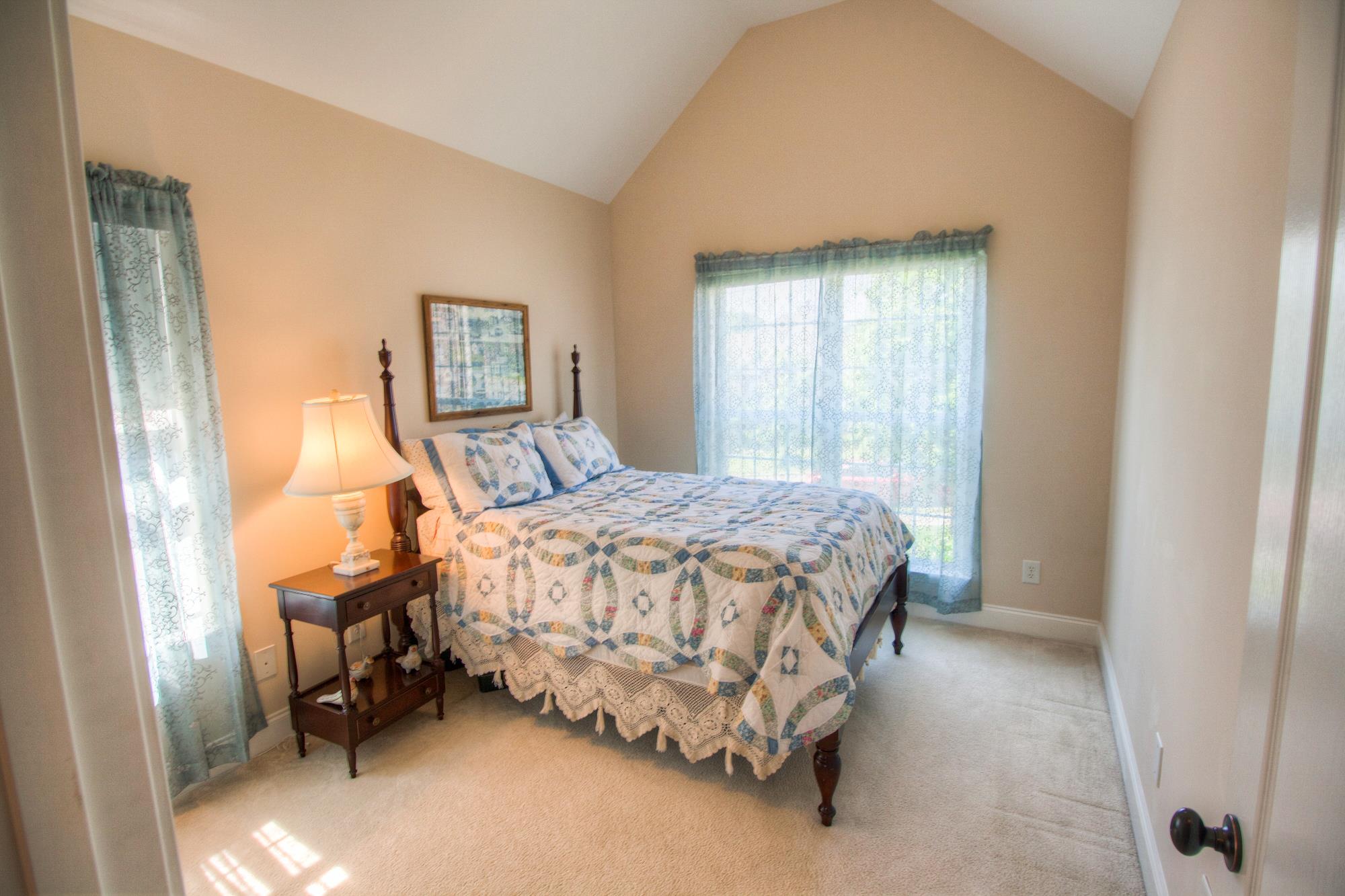 7084 Red Apple Road Antioch, TN 37013 - Photo 19 of 30 a bedroom with a bed and a window