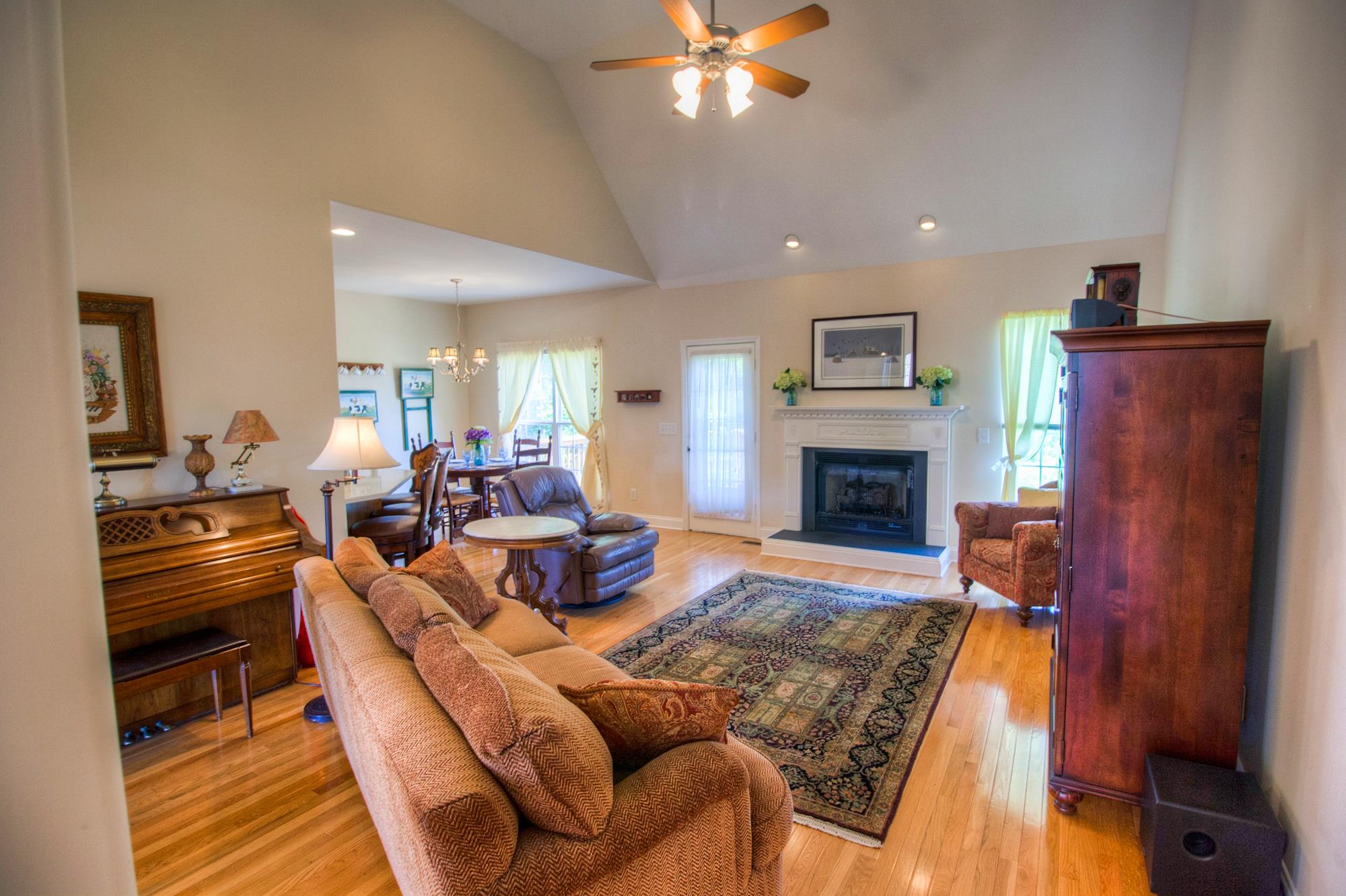 7084 Red Apple Road Antioch, TN 37013 - Photo 4 of 30 a living room with furniture and a fireplace