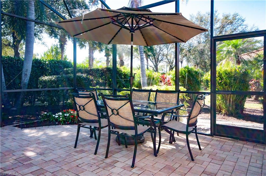 19896 Casa Verde Way Estero, FL 33967 - Photo 34 of 48 a view of chair and tables in the patio