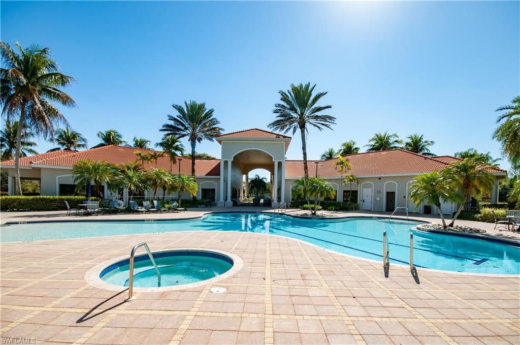 19896 Casa Verde Way Estero, FL 33967 - Photo 42 of 48 a swimming pool with outdoor seating and yard