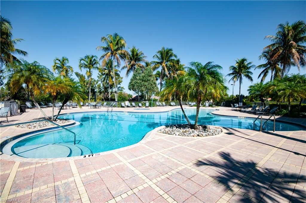 19896 Casa Verde Way Estero, FL 33967 - Photo 43 of 48 a view of a swimming pool with a yard
