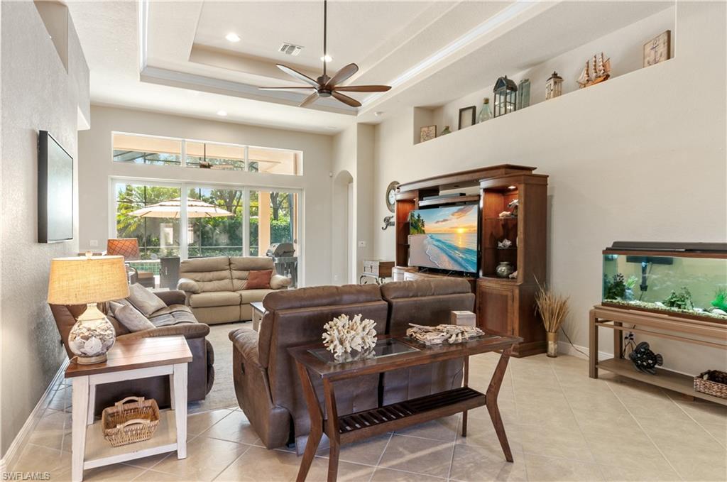 19896 Casa Verde Way Estero, FL 33967 - Photo 8 of 48 a living room with furniture and a flat screen tv