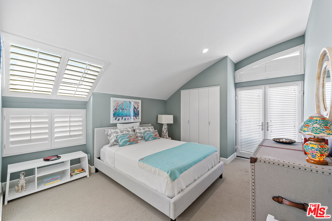 3741 Ocean Drive Oxnard, CA 93035 - Photo 18 of 29 a bedroom with a bed and a window