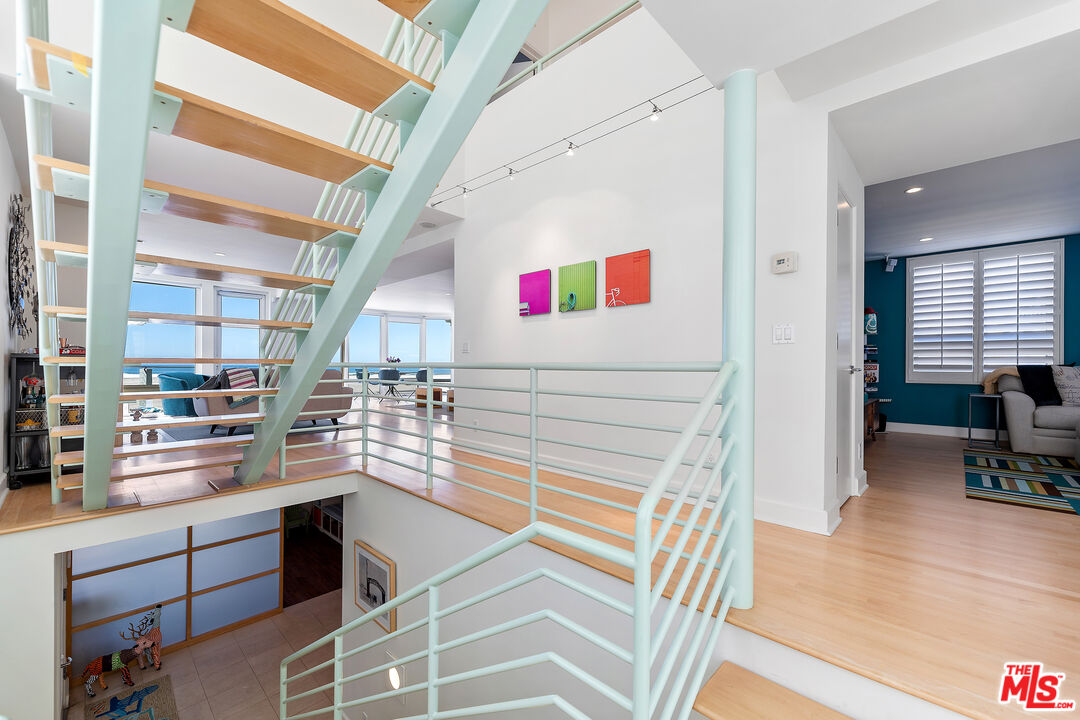 3741 Ocean Drive Oxnard, CA 93035 - Photo 21 of 29 a kitchen with stainless steel appliances granite countertop a sink and cabinets