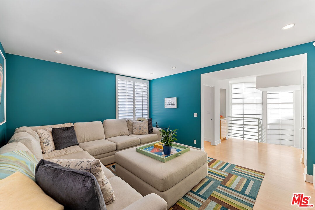 3741 Ocean Drive Oxnard, CA 93035 - Photo 22 of 29 a living room with furniture and a large window