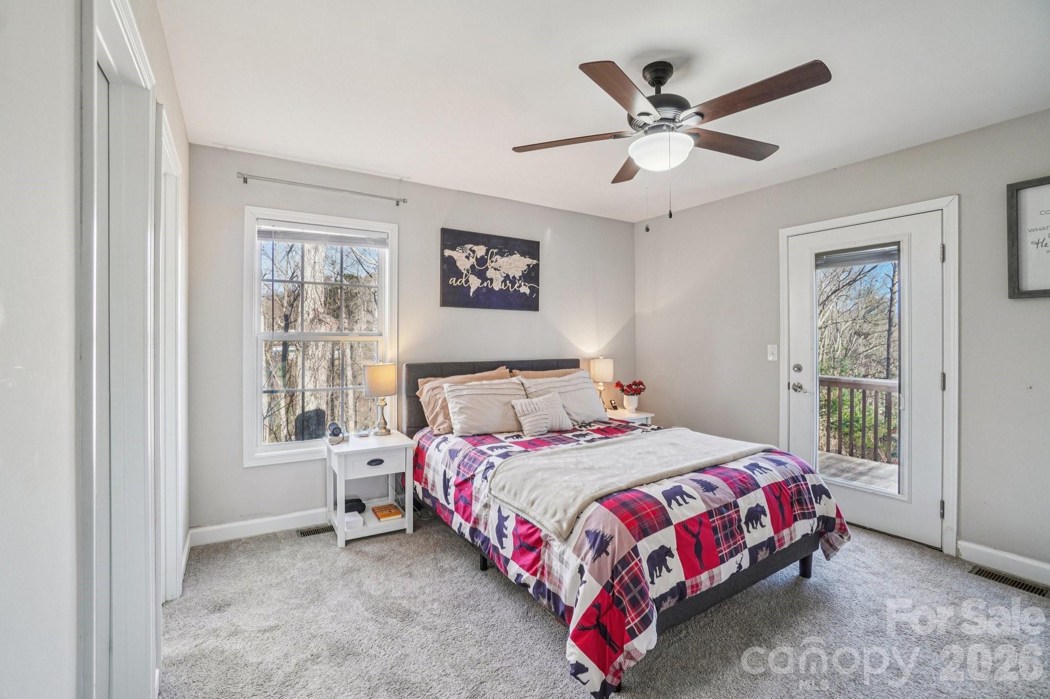 178 Rowe Court Hendersonville, NC 28792 - Photo 14 of 21 a bedroom with a bed and window