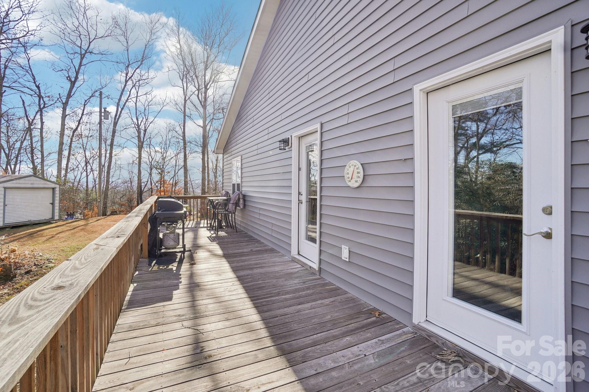 178 Rowe Court Hendersonville, NC 28792 - Photo 16 of 21 a view of outdoor space with deck and living room