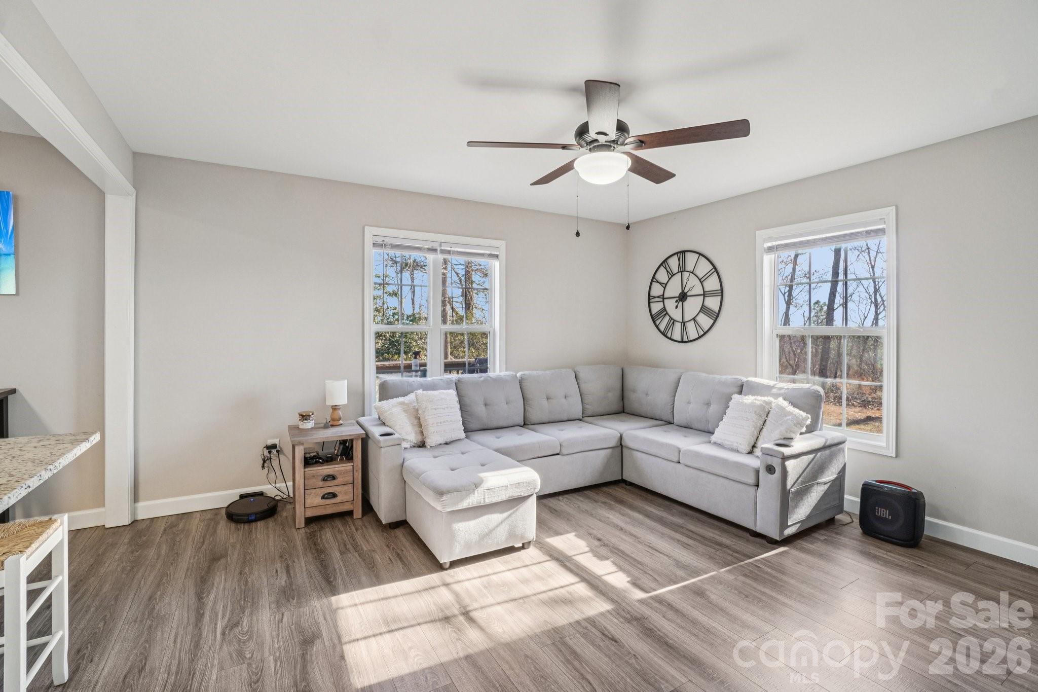 178 Rowe Court Hendersonville, NC 28792 - Photo 2 of 21 a living room with furniture and a large window