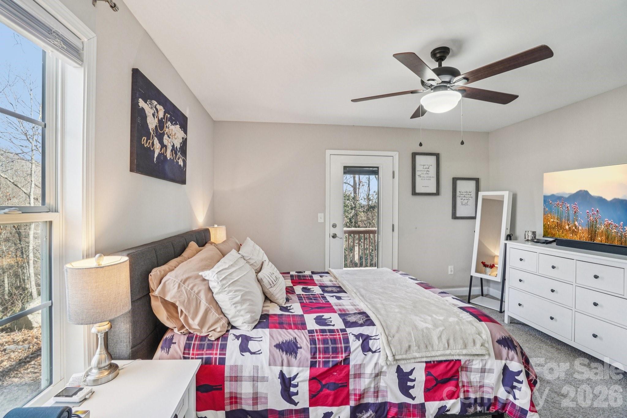 178 Rowe Court Hendersonville, NC 28792 - Photo 9 of 21 a bed room with a bed and a dresser