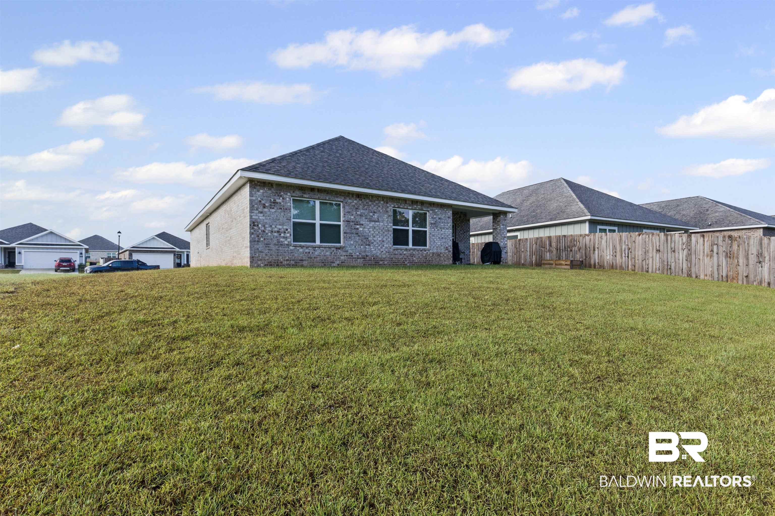 10564 Heirloom Road South Mobile, AL 36608 - Photo 22 of 24 Back of property featuring brick siding