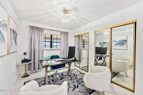 a swimming pool with outdoor seating and yard