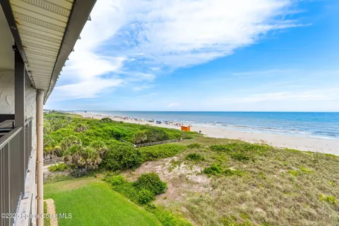 a view of balcony with patio