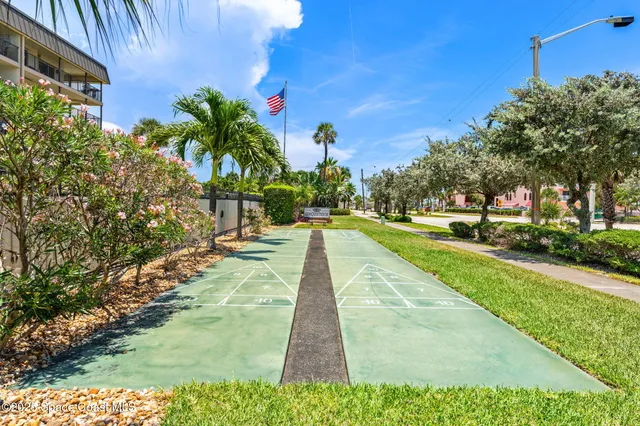 a view of an ocean and a yard