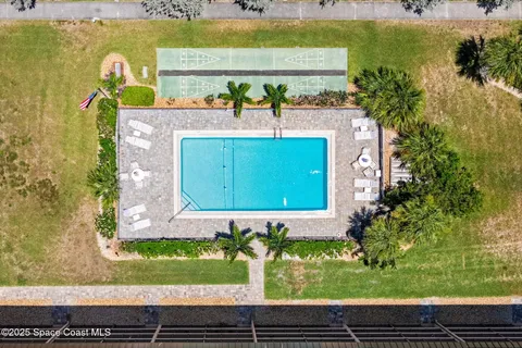 a view of a lake with a building in the background