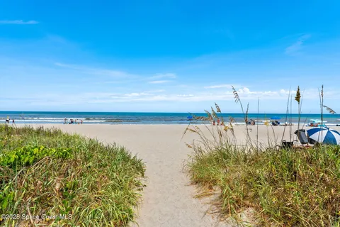 a view of multiple houses with a city street