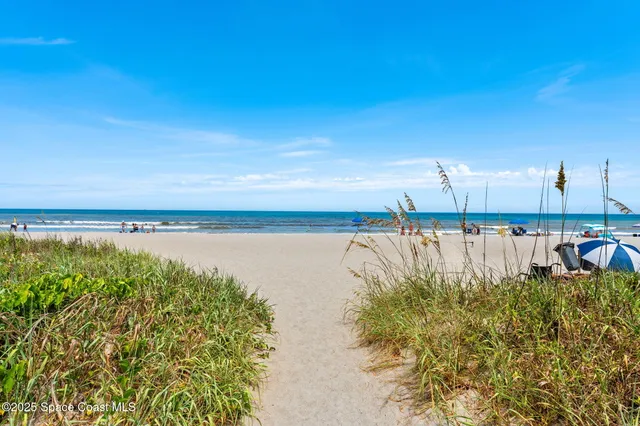 a view of multiple houses with a city street