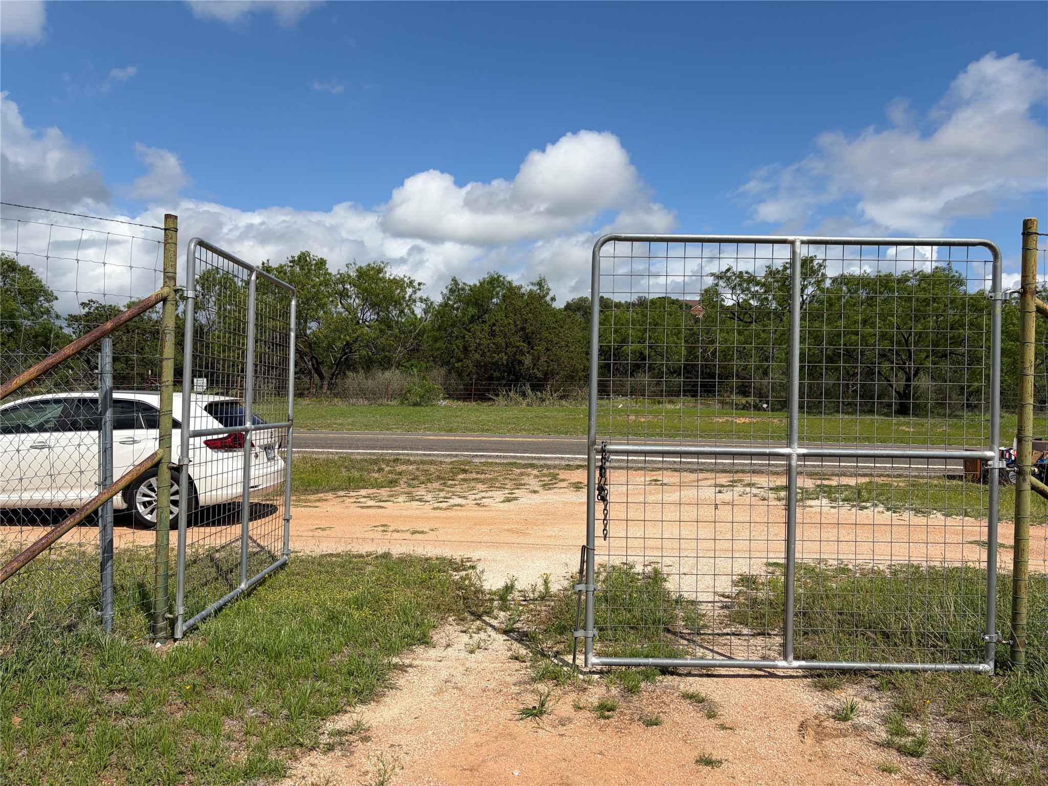 1060 Ranch Road 3404 Kingsland, TX 78639 - Photo 2 of 15 Entrance. High fence.