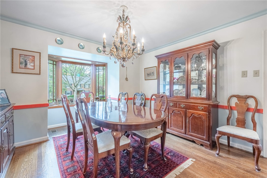 156 West Hadley Road Dayton, OH 45419 - Photo 7 of 71 This dining area features hardwood flooring and an elegant bay window, ideal for gatherings.