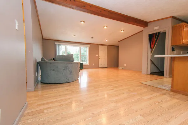 a view of an empty room with a window