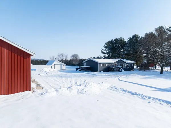 a view of a snow on the side of the road