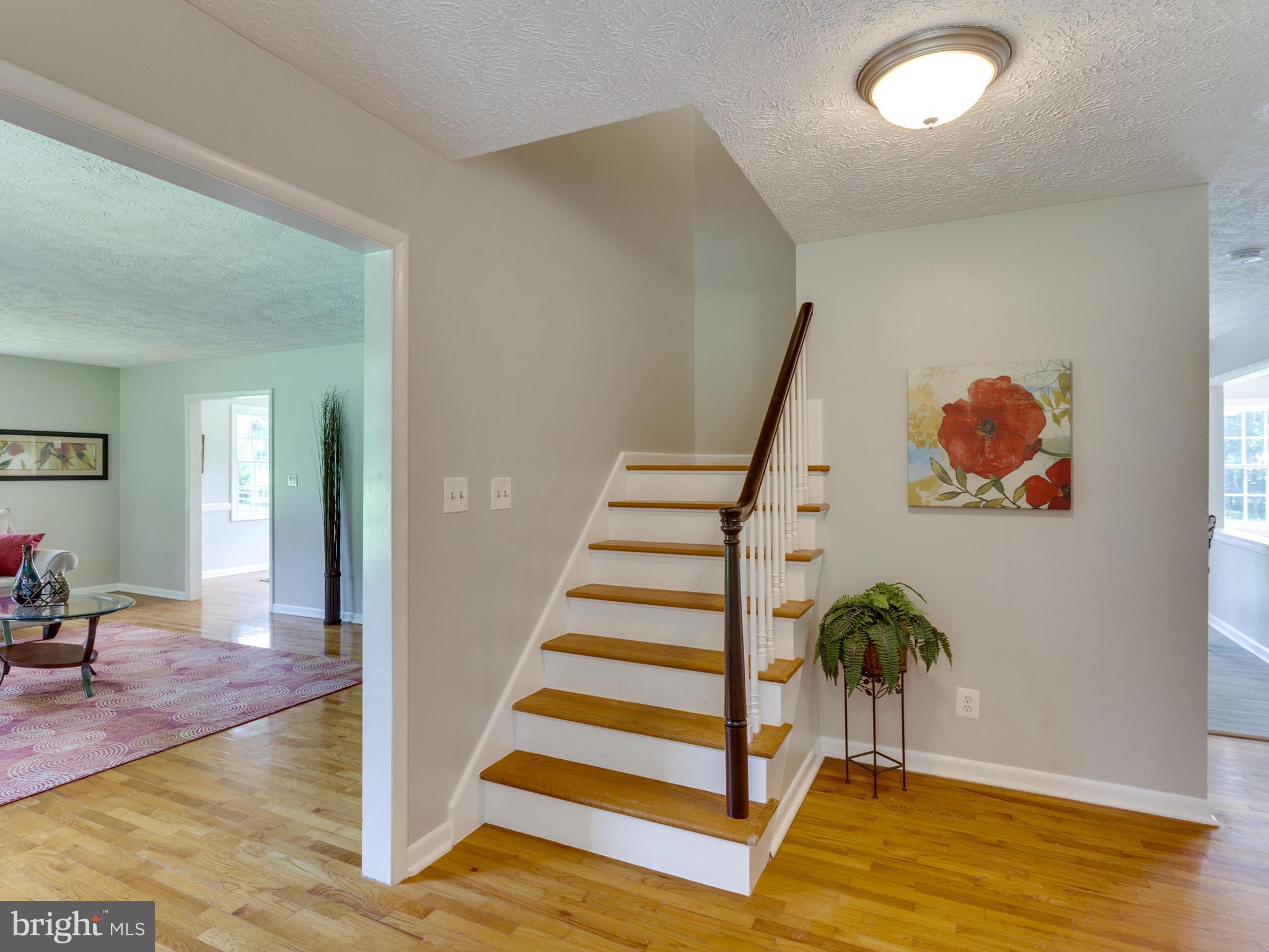11617 Stuart Mill Road Oakton, VA 22124 - Photo 13 of 30 a view of entryway with wooden floor