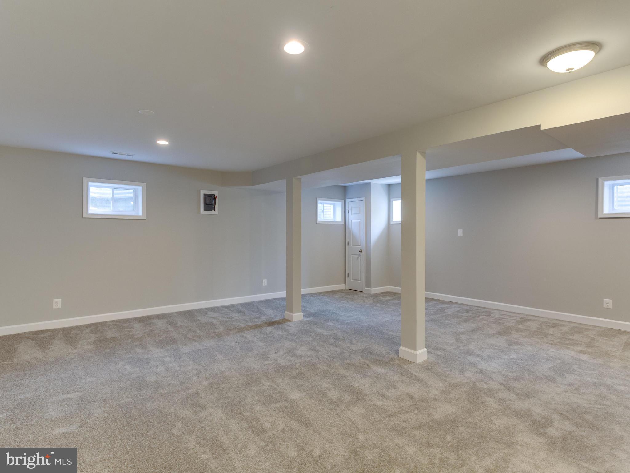 11617 Stuart Mill Road Oakton, VA 22124 - Photo 19 of 30 an empty room with window and pillar in it