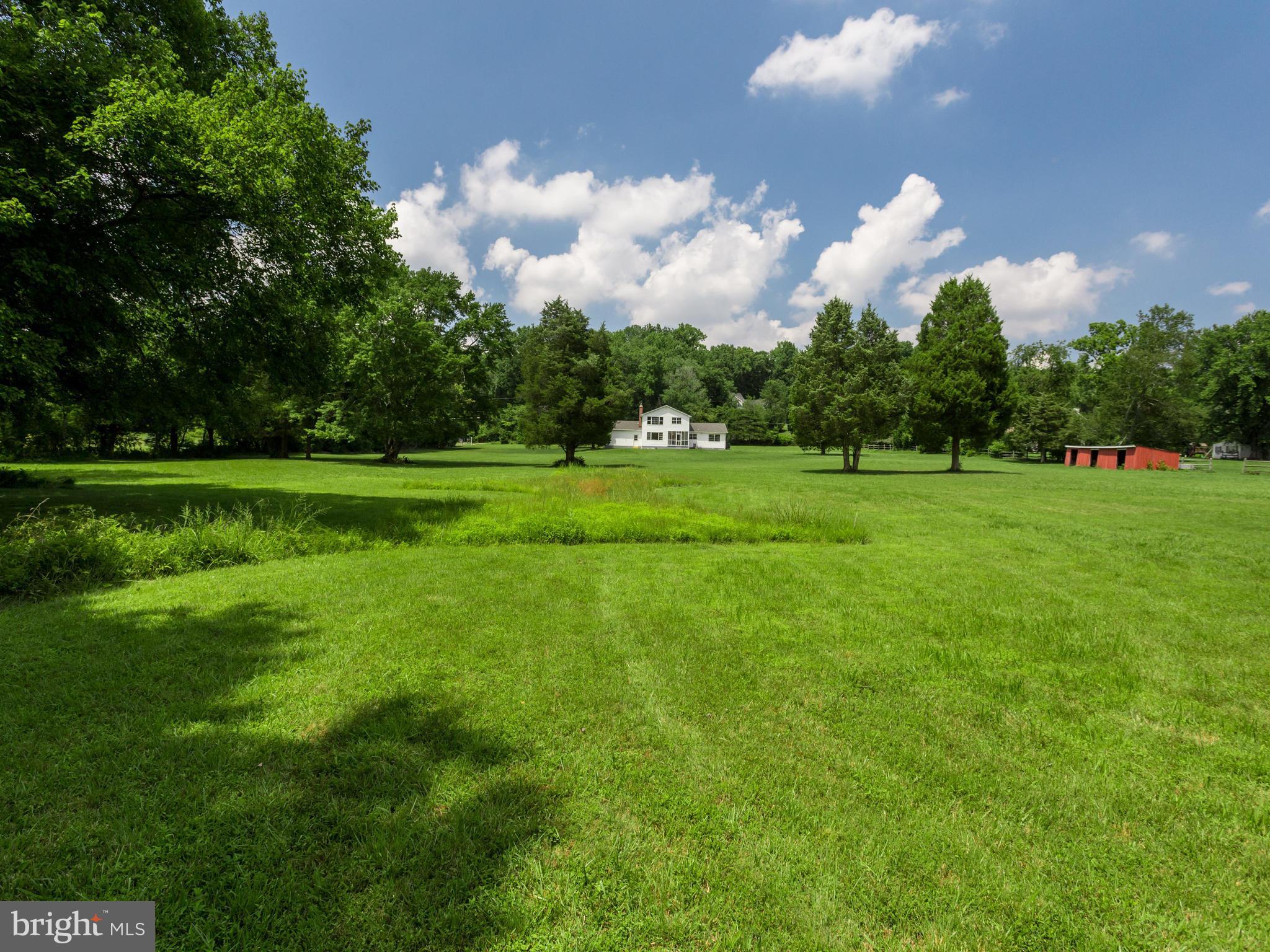 11617 Stuart Mill Road Oakton, VA 22124 - Photo 24 of 30 a view of a golf course with a big yard