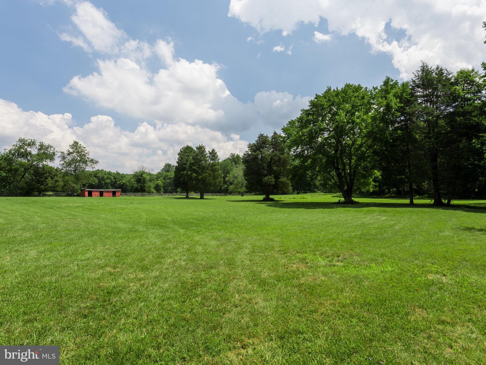 11617 Stuart Mill Road Oakton, VA 22124 - Photo 26 of 30 a view of field with trees in the background