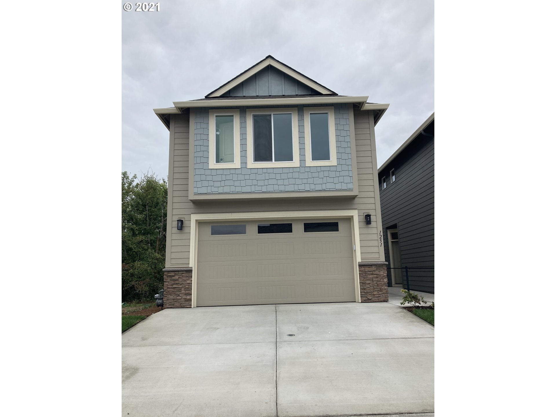 1251 South Union Place Ridgefield, WA 98642 - Photo 1 of 11 a view of a house with garage