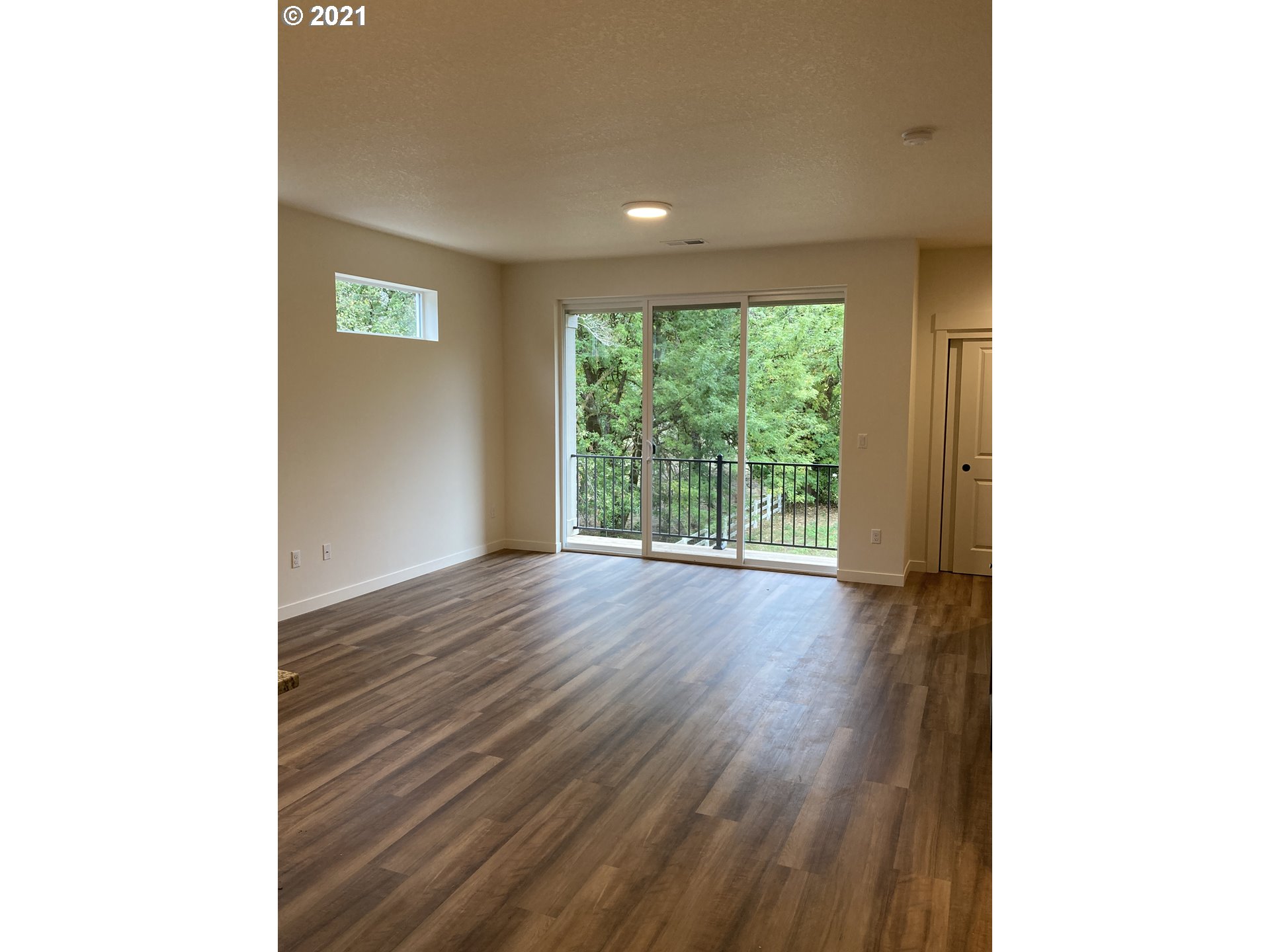 1251 South Union Place Ridgefield, WA 98642 - Photo 6 of 11 a view of a room with wooden floor and window