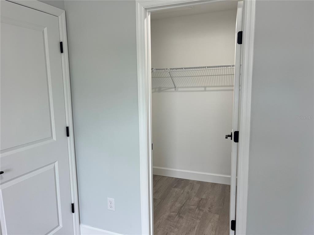 7209 Ancha Street Sebring, FL 33872 - Photo 13 of 20 a view of a walk in closet