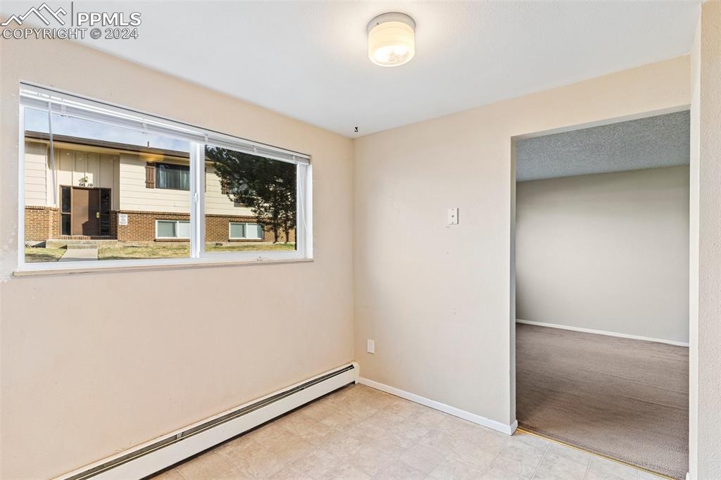 6602 Dublin Loop West, Unit 1 Colorado Springs, CO 80918 - Photo 13 of 23 an empty room with window