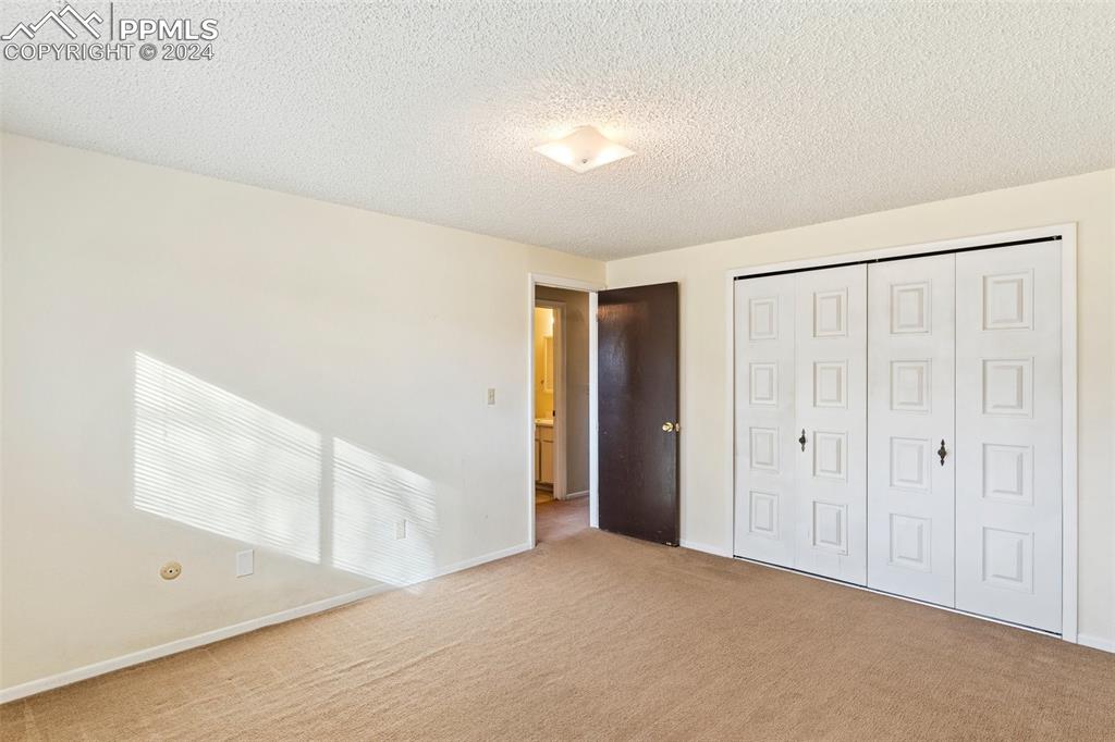 6602 Dublin Loop West, Unit 1 Colorado Springs, CO 80918 - Photo 15 of 23 a view of an empty room