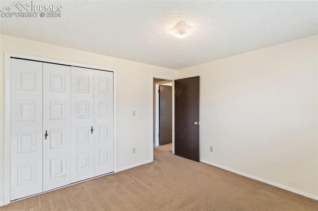 6602 Dublin Loop West, Unit 1 Colorado Springs, CO 80918 - Photo 16 of 23 a view of an empty room