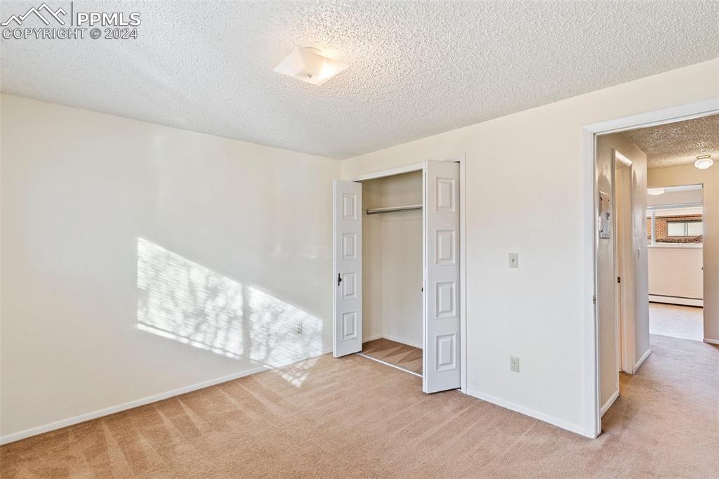 6602 Dublin Loop West, Unit 1 Colorado Springs, CO 80918 - Photo 18 of 23 an empty room with windows