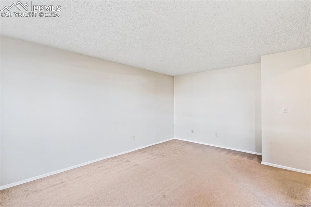 6602 Dublin Loop West, Unit 1 Colorado Springs, CO 80918 - Photo 7 of 23 a view of an empty room