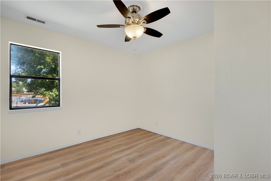 135 Seminole Road Sunrise Beach, MO 65079 - Photo 14 of 41 Main level bedroom