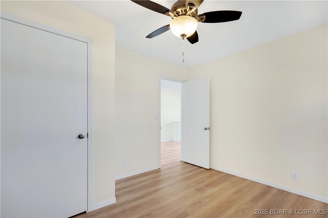 135 Seminole Road Sunrise Beach, MO 65079 - Photo 16 of 41 Main level bedroom