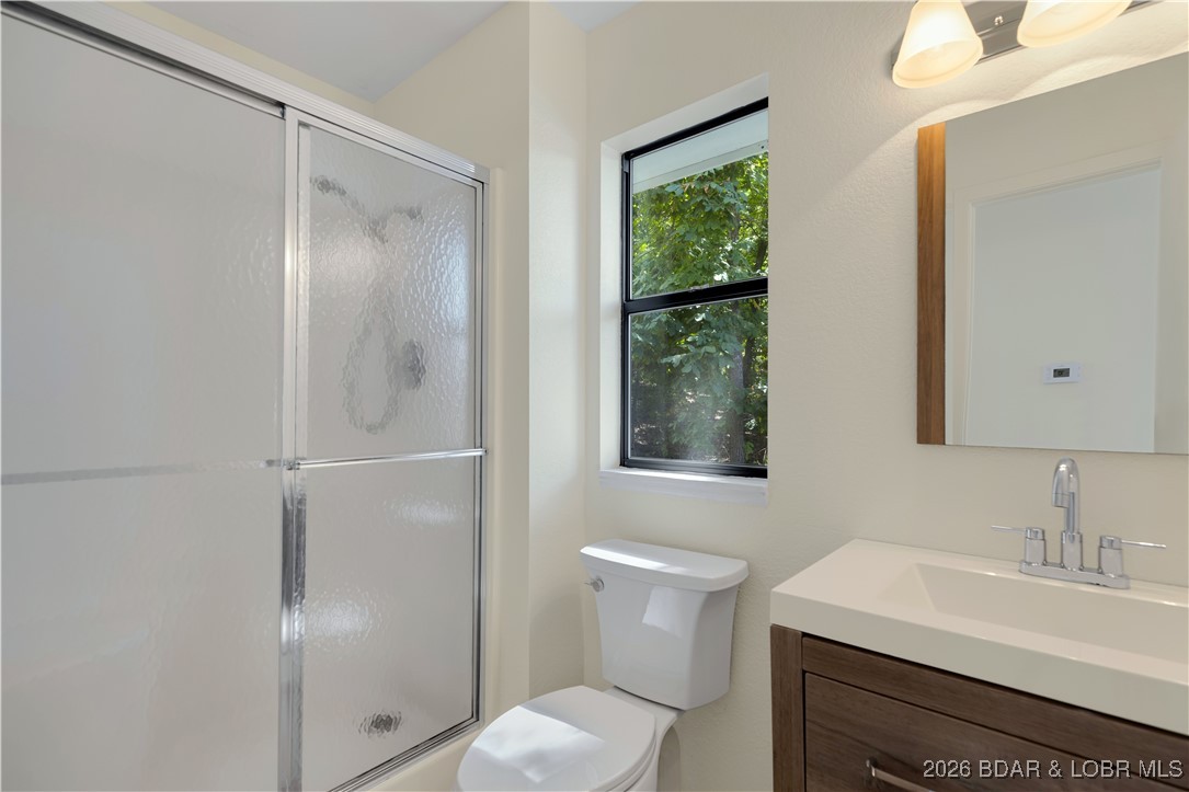 135 Seminole Road Sunrise Beach, MO 65079 - Photo 17 of 41 Main level bathroom