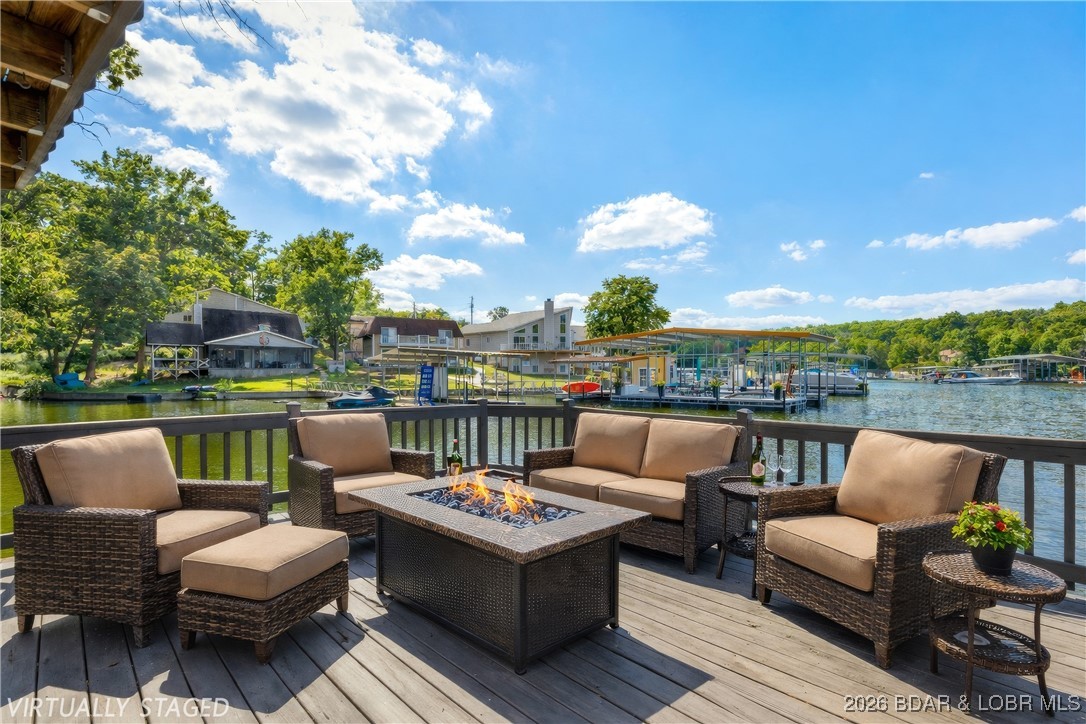 135 Seminole Road Sunrise Beach, MO 65079 - Photo 2 of 41 Martini Deck extended over the lake