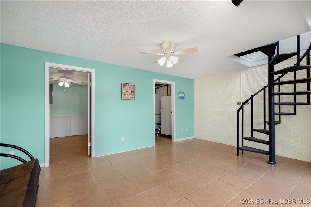 135 Seminole Road Sunrise Beach, MO 65079 - Photo 23 of 41 Lower level family room