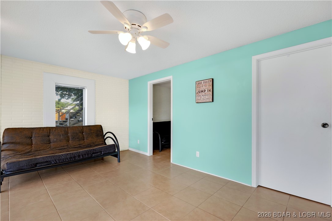 135 Seminole Road Sunrise Beach, MO 65079 - Photo 24 of 41 Lower level family room