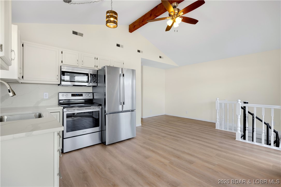 135 Seminole Road Sunrise Beach, MO 65079 - Photo 7 of 41 Main level living