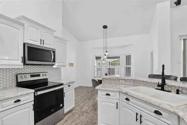 $699,999 | 5232 Hammock Circle, St. Cloud, FL 34771